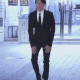 confident walking suitq Slack emoji