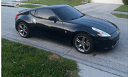 black sports car parked Slack emoji