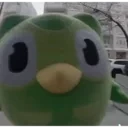 green owl plush Slack emoji
