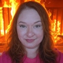 woman fireplace cozy smile Slack emoji