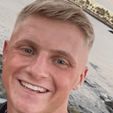 smiling blond beach Slack emoji