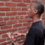 talking to wall Slack emoji