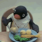 pingu eating Slack emoji