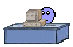 xxx under desk Slack emoji