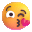 face blowing a kiss Slack emoji