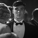 man tuxedo serious face Slack emoji