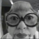 woman large glasses surprised Slack emoji