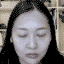 woman eyes closed peaceful Slack emoji