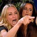 women pointing Slack emoji