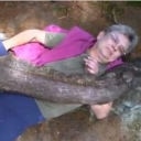 tired person hugging log Slack emoji
